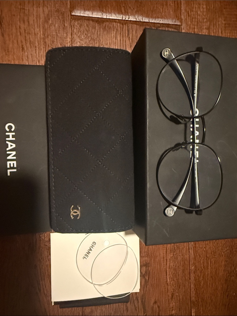 CHANEL Black Eyeglasses with round frames